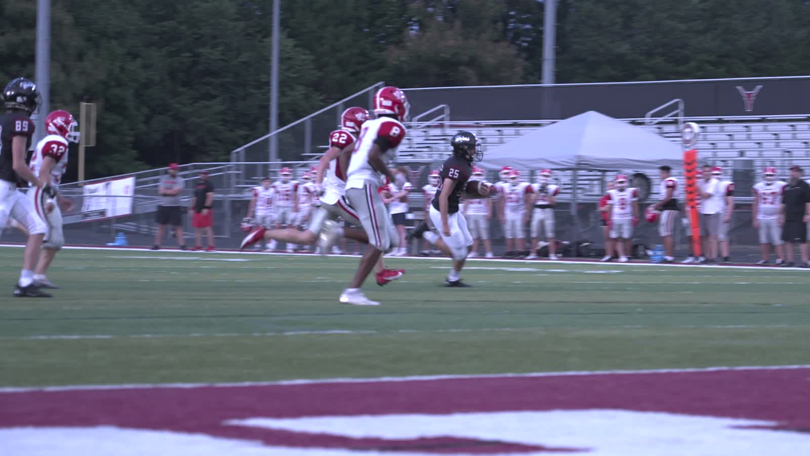 Player breaking for the end zone